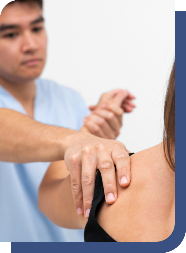 A frozen shoulder chiropractor performing a gentle shoulder manipulation to address frozen shoulder pain