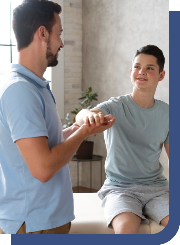 A carpal tunnel chiropractor providing wrist and hand therapy to a young patient for carpal tunnel syndrome relief